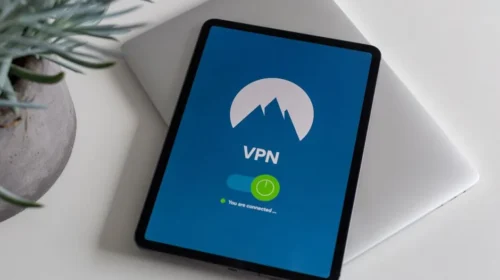Modern tablet displaying a connected VPN app screen, symbolizing cybersecurity.